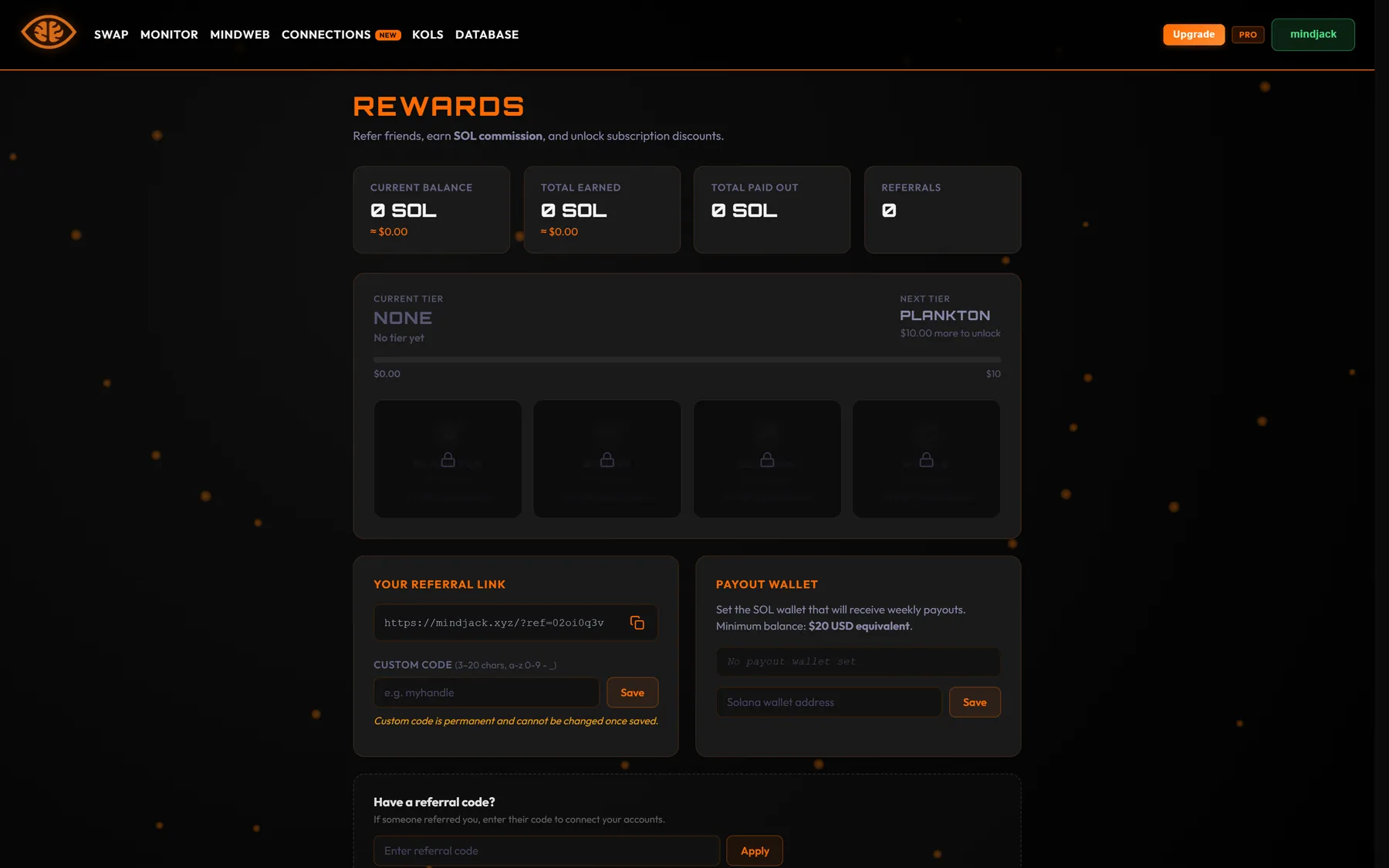 Rewards page with balance cards, tier ladder, referral link and payout wallet form